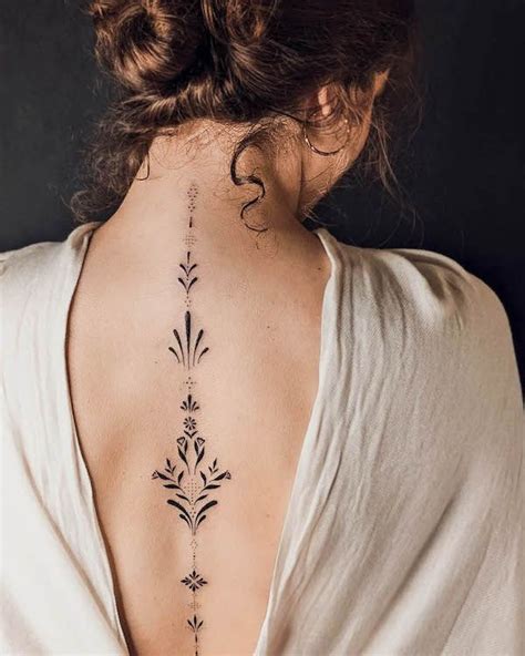 dainty spine tattoos|female spine tattoo designs.